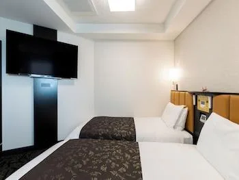 Compact, 2 Double Beds, Corner، APA Hotel Takaoka Ekimae 1/2