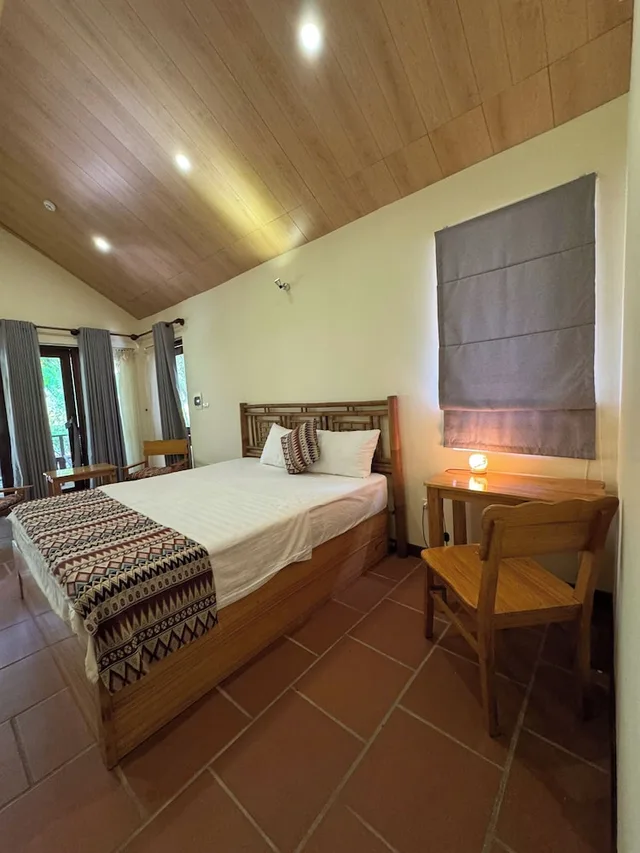 بنغل ديلوكس بسرير كينج بإطلالة على الحديقة، Wildland Resort 1/3