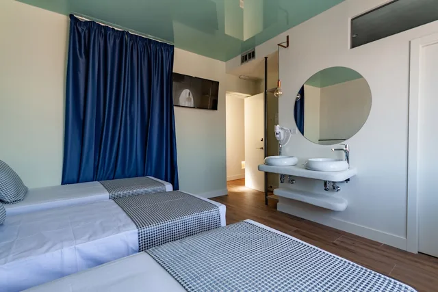 Room, Triple, 3 Beds, City View, Hostal Charlotte 1/3
