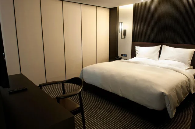 جناح عائلي ديلوكس بسرير كينج مع أريكة، Xi'an Eastern House Boutique Hotel 3/10