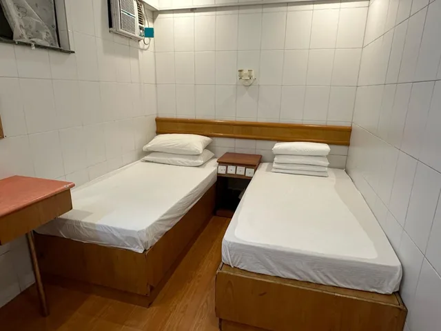 غرفة بسريرين منفصلين بحمام مشترك، Kowloon New Hostel 1/4