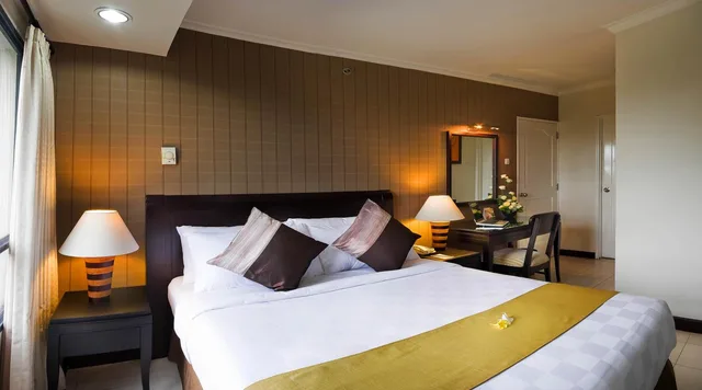 2 Bedrooms, Family, Double and Twin Beds, Grand Tropic Suites Jakarta 1/3