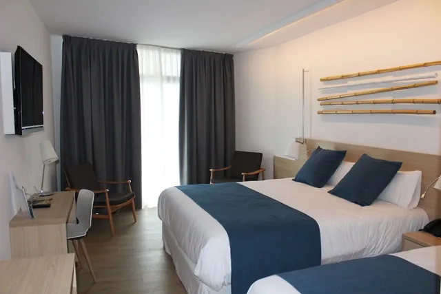 Triple design (2adults+1child)، Aqua Hotel Onabrava 1/6