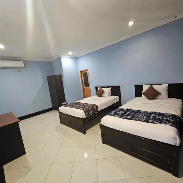 غرفة قياسية بسريرين منفصلين بإطلالة على الحديقة، Ridho Malik Hotel 2/7
