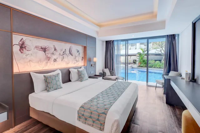 Suite, Double Bed, Pool Access، Sunday Hotel Sunset Road Near Trans Studio Mall 2/4