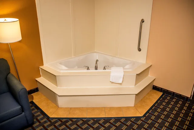 Suite, King Bed, Sofa, Bathtub, Holiday Inn Express Hotels Suites Cocoa Beach 4/7