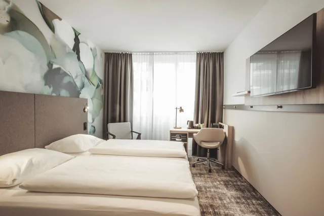 غرفة قياسية بسريرين منفصلين لذوي الإعاقة، Wyndham Garden Munich Messe 5/9