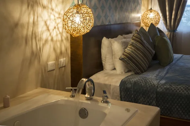 غرفة فاخرة بسرير كينج بجاكوزي، Quinta Margarita Suites 7/7