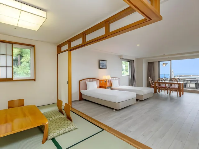 غرفة يابانية غربية ديلوكس بسرير فردي بإطلالة على البحر بشرفة، Ambient Izukogen Annex Hotel 1/1