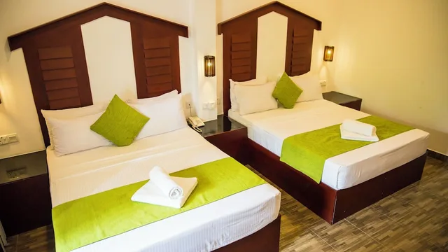 غرفة عائلية بسريرين كينج بشرفة، Sundaras Resort 1/1