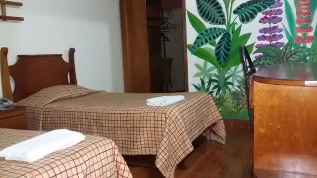 غرفة قياسية بسريرين منفصلين، Hotel Casa Las Orquideas 3/4
