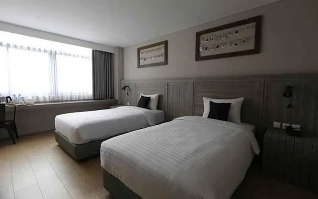 غرفة ديلوكس بسريرين منفصلين، Beehive Boutique Hotel 1/4
