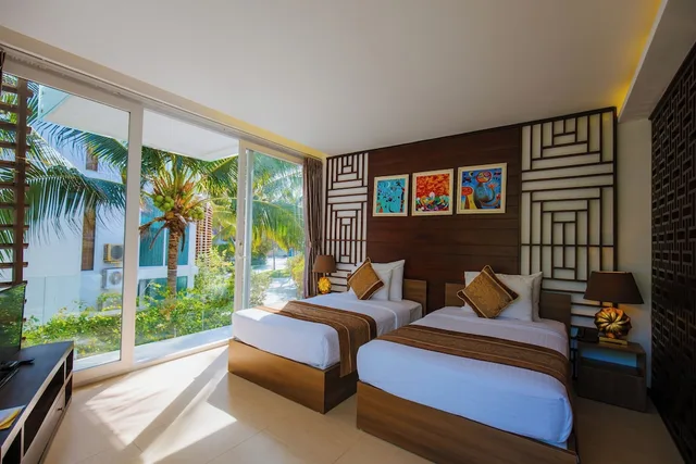 غرفة غراند بريميوم بسرير كينج بإطلالة على الحديقة، Villa Del Sol Beach Villas & Spa 4/10