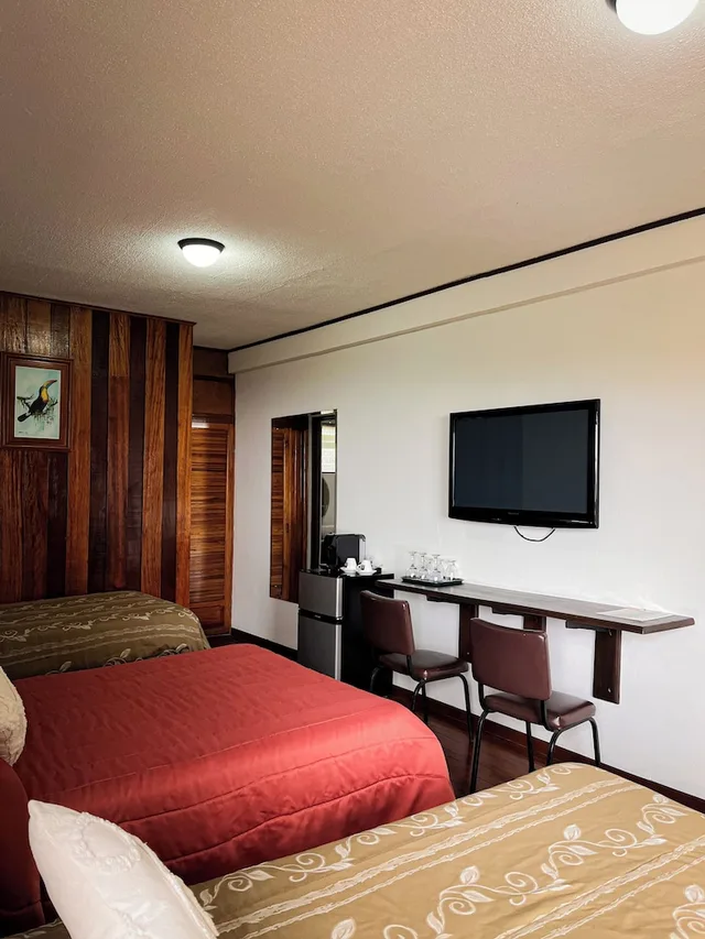 غرفة قياسية بسرير مزدوج وسرير فردي بإطلالة على الحديقة، Hotel de Montana Monteverde 8/10