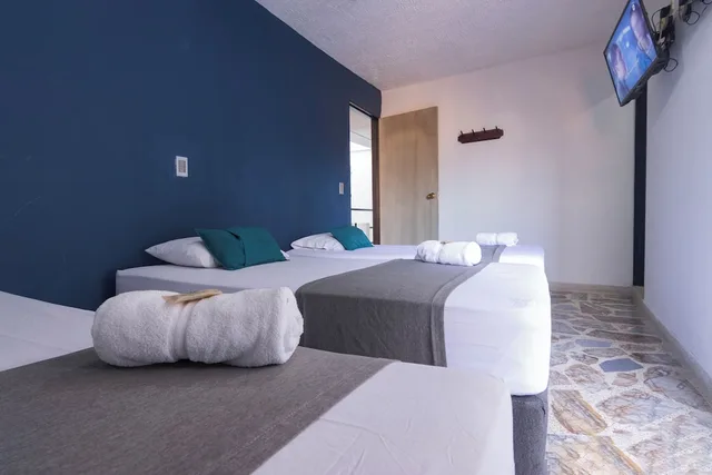 غرفة ثلاثية بسرير مزدوج وسرير فردي، Ayenda 1228 Balcones de la 70 7/9