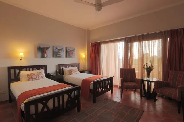 غرفة بسريرين منفصلين بإطلالة على الحديقة، Haile Resort Hawassa 1/9