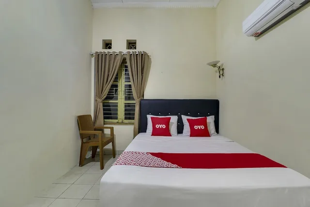 غرفة قياسية بسرير مزدوج، Hotel O Villa Inn App Trawas Bintaro Syariah 4/10