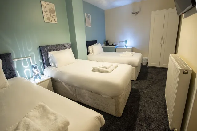 غرفة ثلاثية بثلاثة أسرّة، Irvine Riverside Guesthouse by Payman Club 3/10