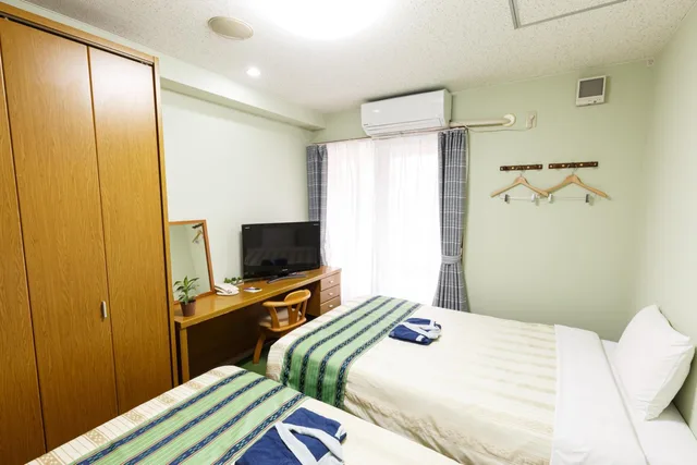 غرفة بسريرين منفصلين، Hotel Peaceland Kume 1/10