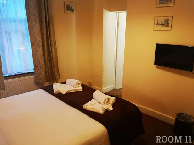 غرفة بسرير مزدوج بحمام مشترك في الملحق، Westgate Hotel 2/3