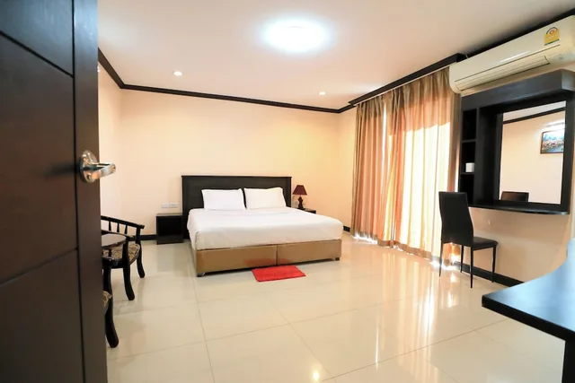 غرفة قياسية بسرير كينج، Triton Place 6/10