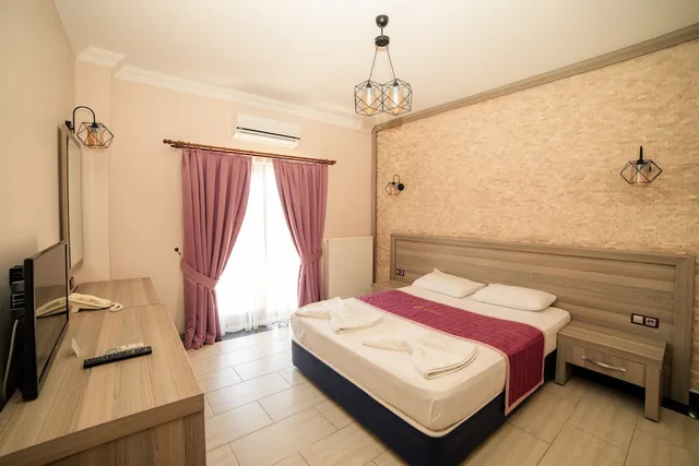 غرفة قياسية بسرير مزدوج بإطلالة على الحديقة بشرفة، Kuzey Park Hotel Arc-En-Ciel 1/6