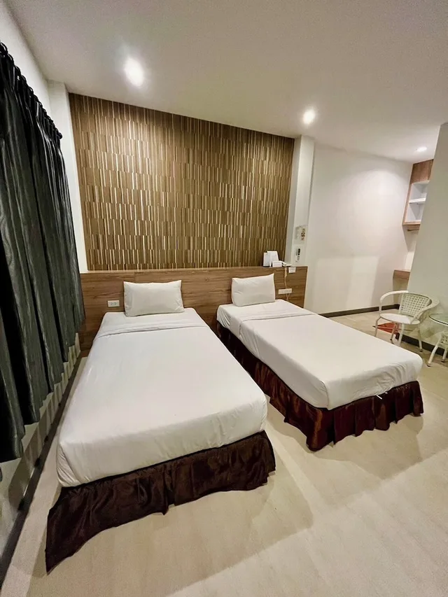 غرفة بسريرين منفصلين، Seree Grand Resort 3/7