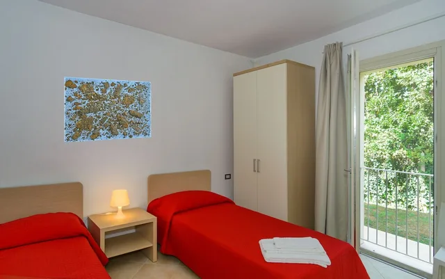 شقة بسريرين منفصلين وسرير كوين بغرفتي نوم مع أريكة، Residence San Rossore 1/8