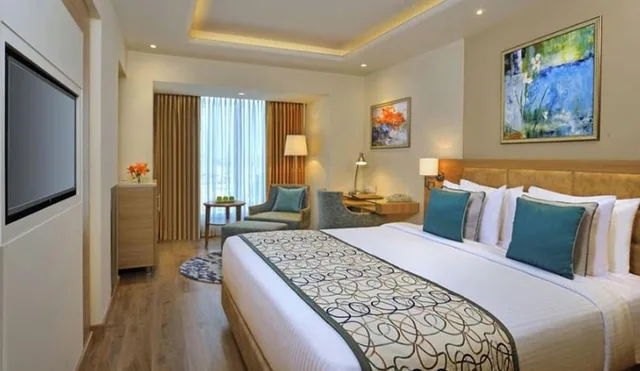 Premium, Double Bed, Golden Sarovar Portico 1/4
