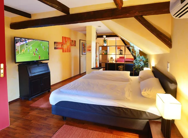 غرفة ثلاثية بسرير كوين مع أريكة، Hotel Stoffels 1/1