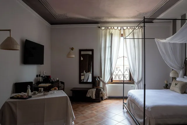 غرفة كلاسيكية رباعية بسرير كينج مع أريكة، Hotel Tenimento Al Castello 7/10