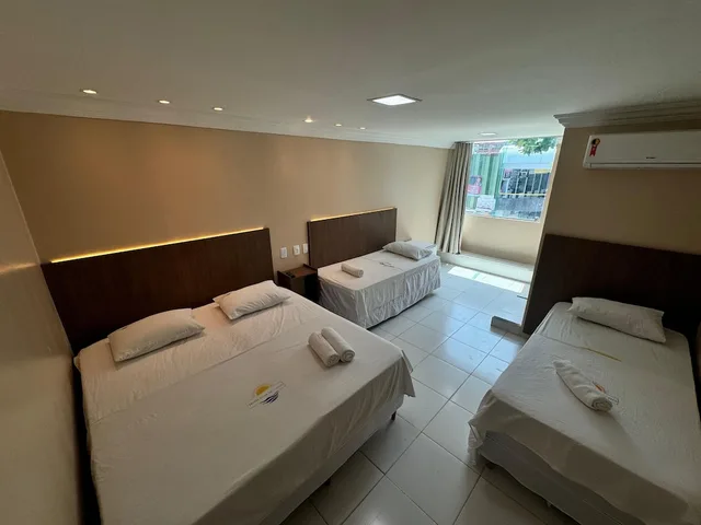 غرفة رباعية بسرير كوين وسريرين منفصلين بإطلالة على البحر، Hotel Luar De Itapua 6/9