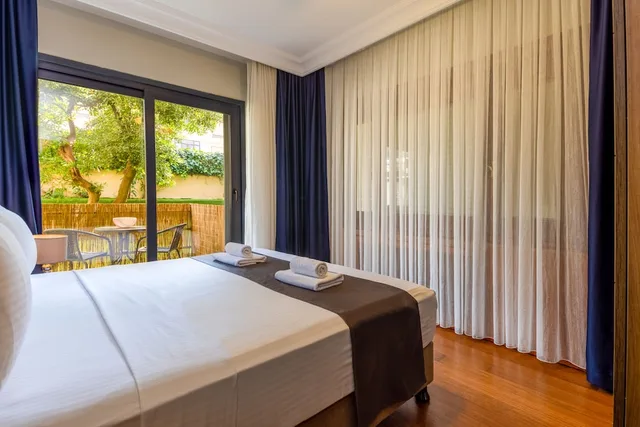 شقة ديلوكس بسريرين كوين بإطلالة على الحديقة بغرفتي نوم مع أريكة، BayMari Suites Florya Istanbul 2/4