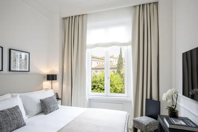 غرفة كلاسيكية بسرير مزدوج بإطلالة على الحديقة، Residenza B 1/3