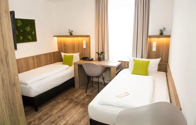 غرفة بسريرين منفصلين، GOLDEN LEAF PERLACH ALLEE HOF 7/10