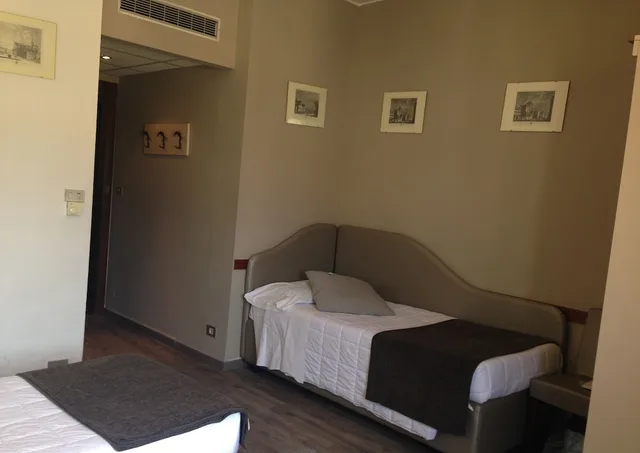 غرفة رباعية بأربعة أسرّة، Mennini Hotel 5/10