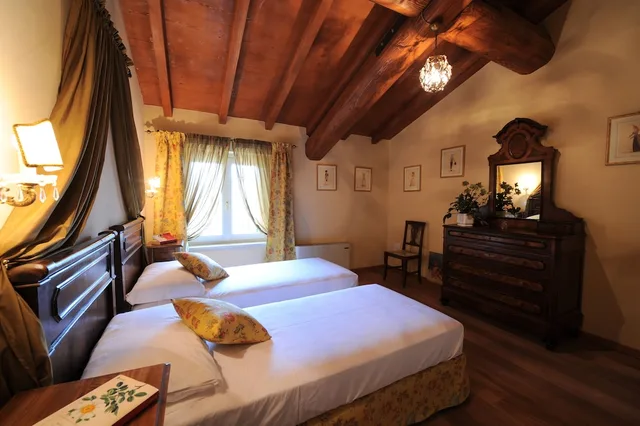 شقة بسرير مزدوج وسريرين منفصلين بغرفتي نوم، Relais Corte Paradiso 6/8