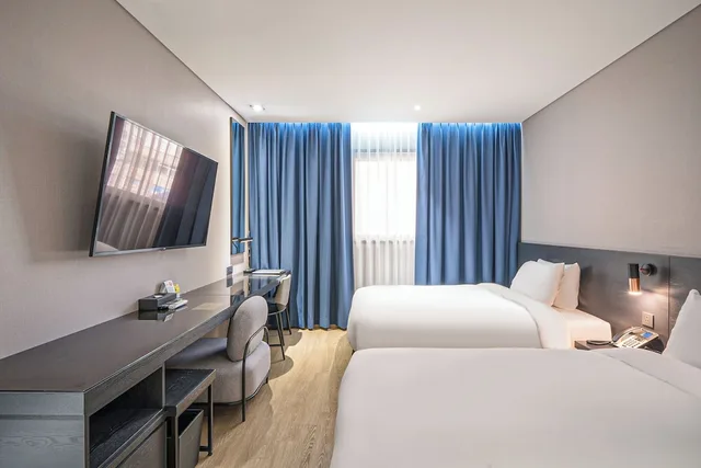 غرفة بريميوم بسريرين منفصلين وسرير كوين، Rivertain Hotel Gyeongju 3/5