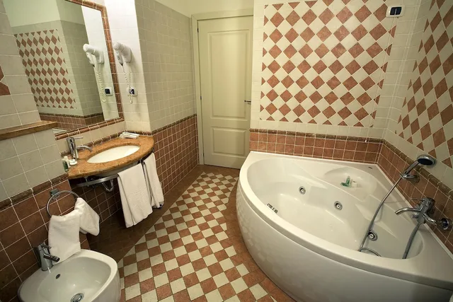 جناح بسرير مزدوج وسريرين منفصلين، Cascina Di Corte 2/2