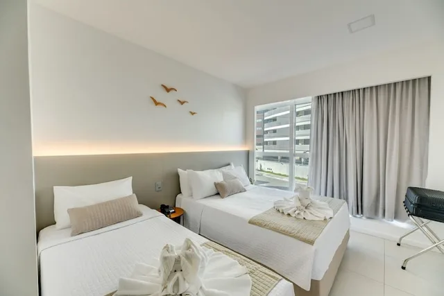 غرفة بريميوم بسرير مزدوج وسرير فردي بإطلالة على المدينة، Hotel Praia Bonita Jatiuca 1/10