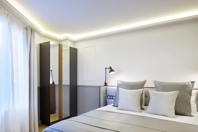 غرفة ديلوكس بسرير كينج، Hotel Petit Lafayette 3/5