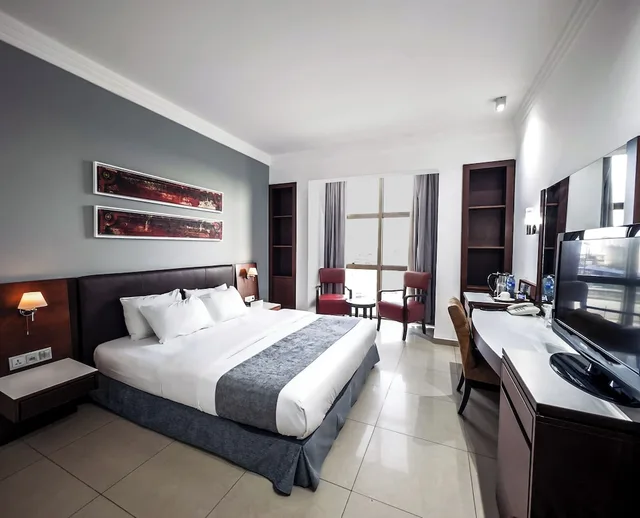 غرفة كلاسيكية مفردة بسرير كوين، The Avenue Suites 1/4