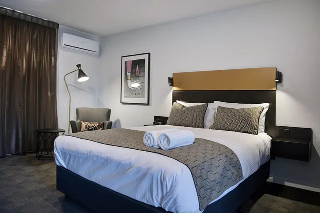 غرفة تنفيذية بسرير كوين، Cbd Motor Inn 3/8
