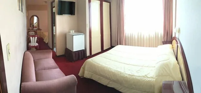 جناح عائلي بسرير مزدوج وسريرين منفصلين، Americana Hotel 2/3