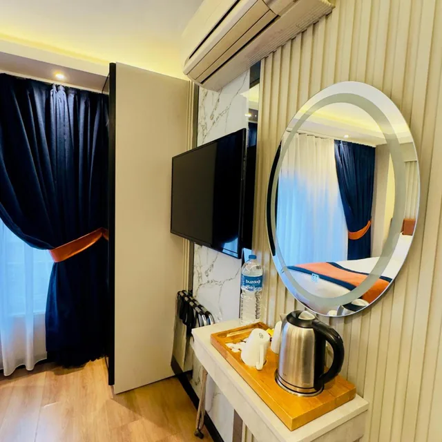 غرفة قياسية بسرير مزدوج أو سريرين منفصلين، Regency World Suite 6/7