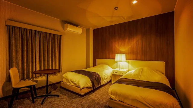 غرفة اقتصادية بسريرين منفصلين بحوض استحمام، Ooedo Onsen Monogatari Premium Toba Saichoraku 1/2