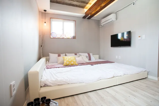 غرفة بسرير مزدوج وسرير فردي، Daemyung Guesthouse 1/4