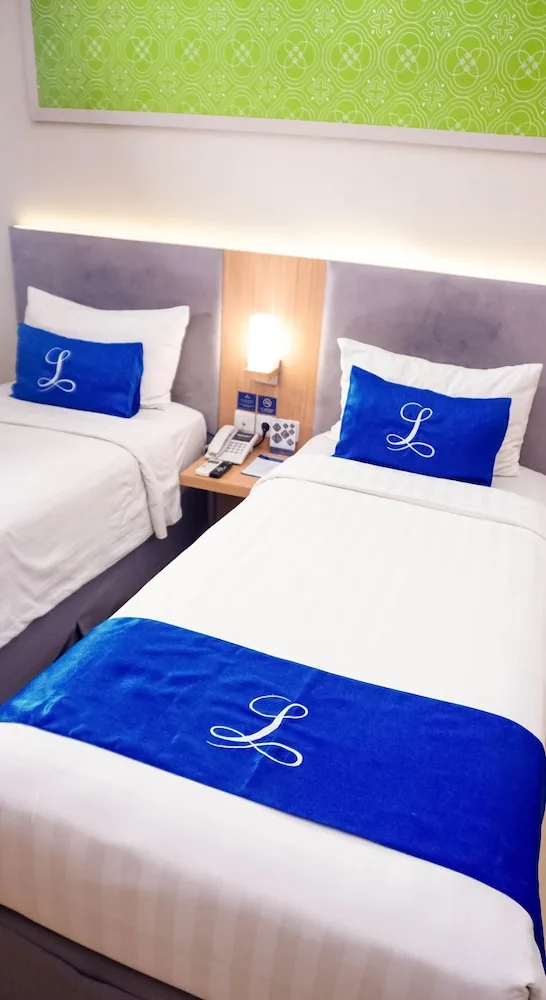غرفة سوبيريور بسرير كوين، Hotel Laksana Solo Managed by Dafam 4/7
