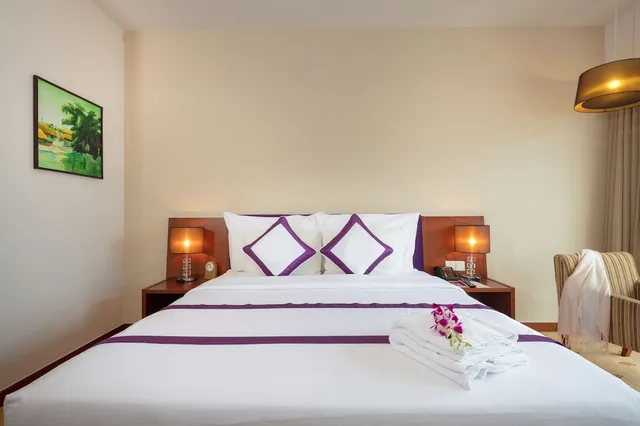 غرفة ديلوكس بسرير كينج بإطلالة جزئية على البحر، TTC Hotel - Michelia 6/10