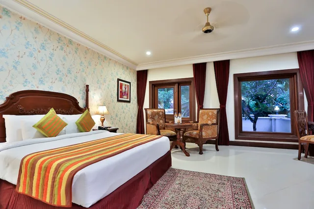 غرفة بريميوم بسرير كينج بإطلالة على الحديقة بشرفة بغرفة نوم واحدة، Regency Lagoon Resort 1/2